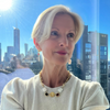 Woman with a city skyline in the background