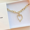 A gold-filled rope style chain heart bracelet with a twisted rope design, presented in a white box with 'The Christy F Collection' branding.