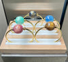 Jewelry display with colorful glass bead bracelet on a wooden stand