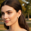 Close-up of a woman with a blurred outdoor background