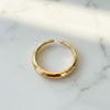 Gold ring on a marble surface