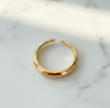 Gold ring on a marble surface